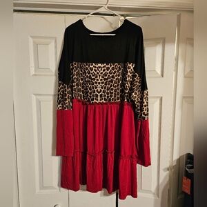 Great top or short dress. Very pretty deep red with black and leopard print.